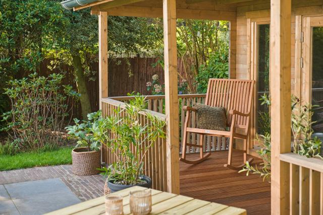 Teak schommelstoel